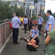 A “Spartan” foreigner was pinned down by the police. (Weibo/ Beijing Youth)